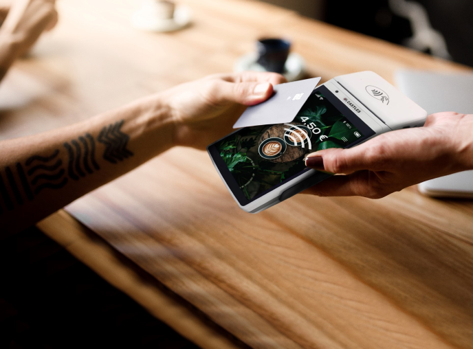 Person using a mobile phone for payment